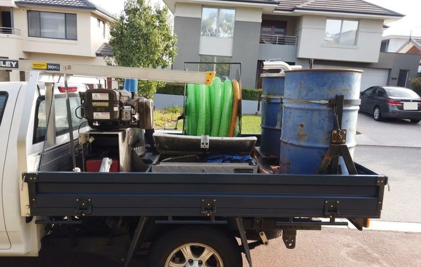 The gutter vacuum unit mounted on a ute at a Perth job